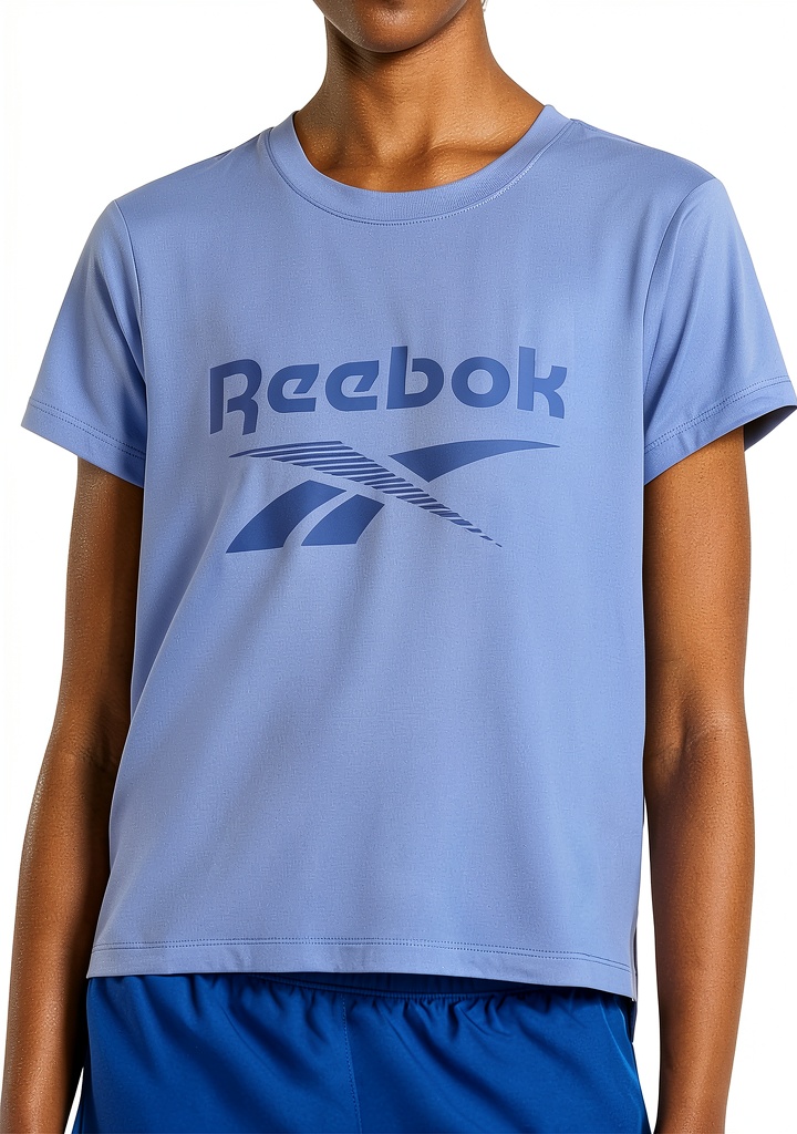 Reebok cropped athletic tee in Ultramarine color on active woman